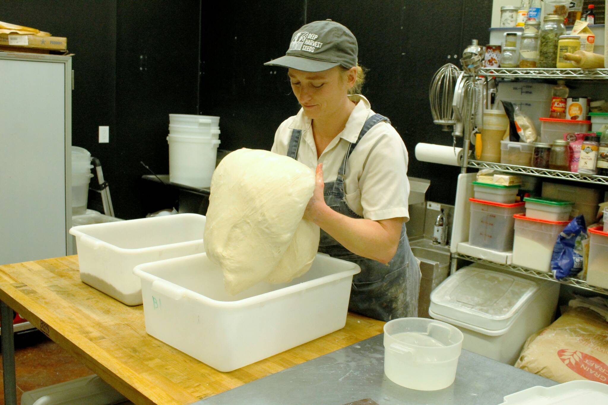 (Photo by Kira Erickson/South Whidbey Record)
Baker Camille Green folds the dough for what will soon be sourdough bread.