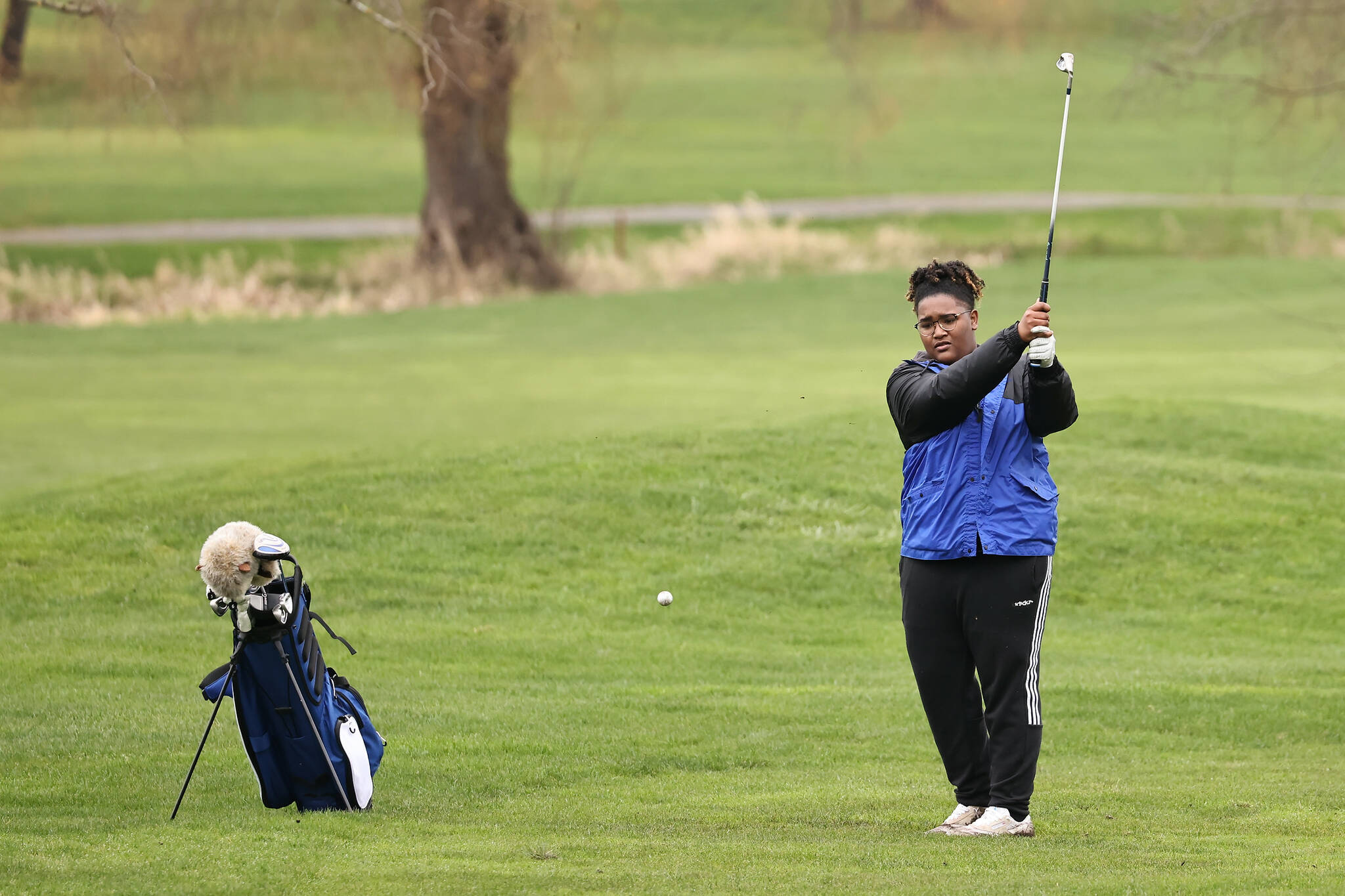 Photo by John Fisken
Junior Essence Bryant watches her shot head to the green. Coach Vicki Cable said the Falcons were excited to welcome Bryant to the team this year, who moved to Whidbey Island from Georgia.