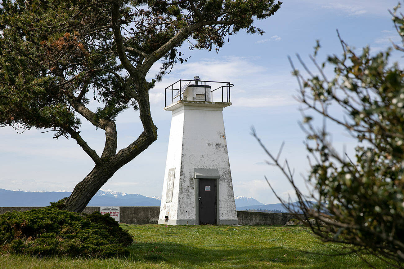 Bush Point Lighthouse is seen on private property Thursday, April 7, 2022, near Freeland, Washington. (Ryan Berry / The Herald)