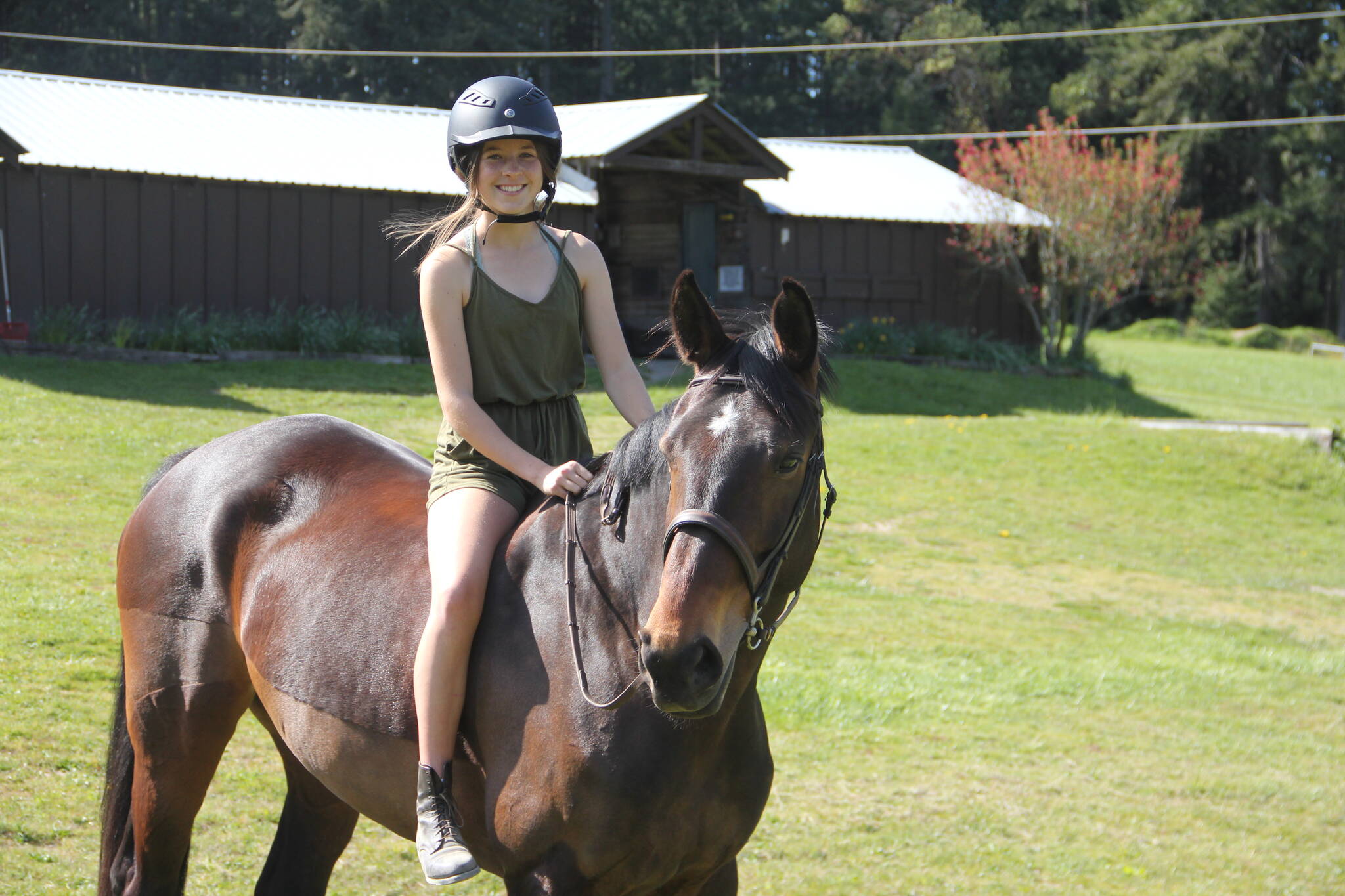 Maddy Racicot, pictured here with horse Serena, recently won the championship title for hunt seat equitation at the 2022 Interscholastic Equestrian Association Nationals Finals. (Photo provided)