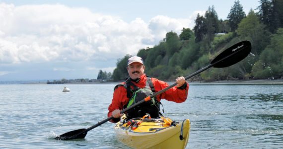 Photo by Kira Erickson/South Whidbey Record
Whidbey Island Kayaking Instructor Ryan D’Jay paddles in a kayak at the South Whidbey Harbor in Langley.