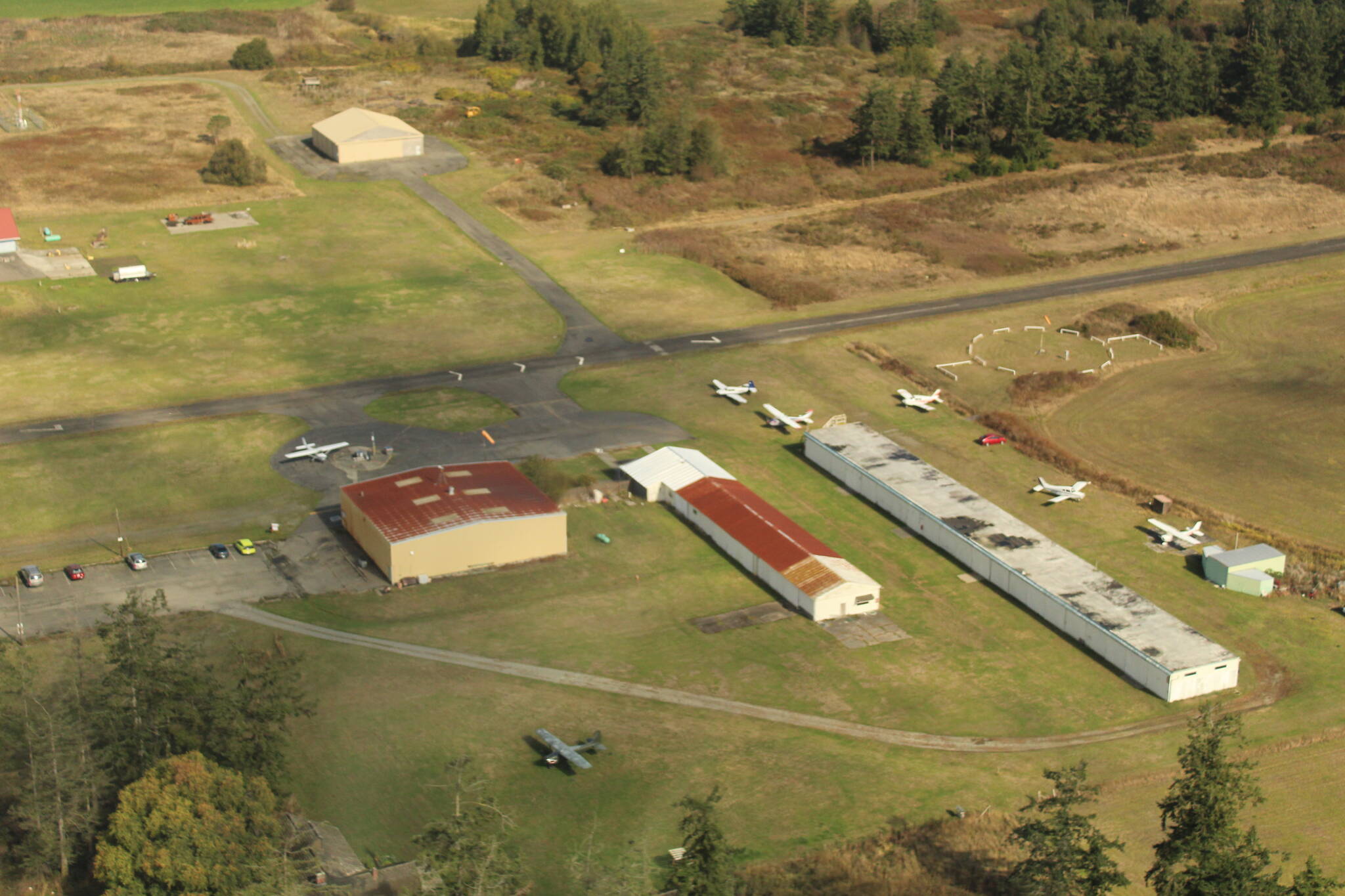 File photos by Karina Andrew/Whidbey News-Times
County commissioners recently voted to negotiate for the purchase of the A. J. Eisenberg Airport.