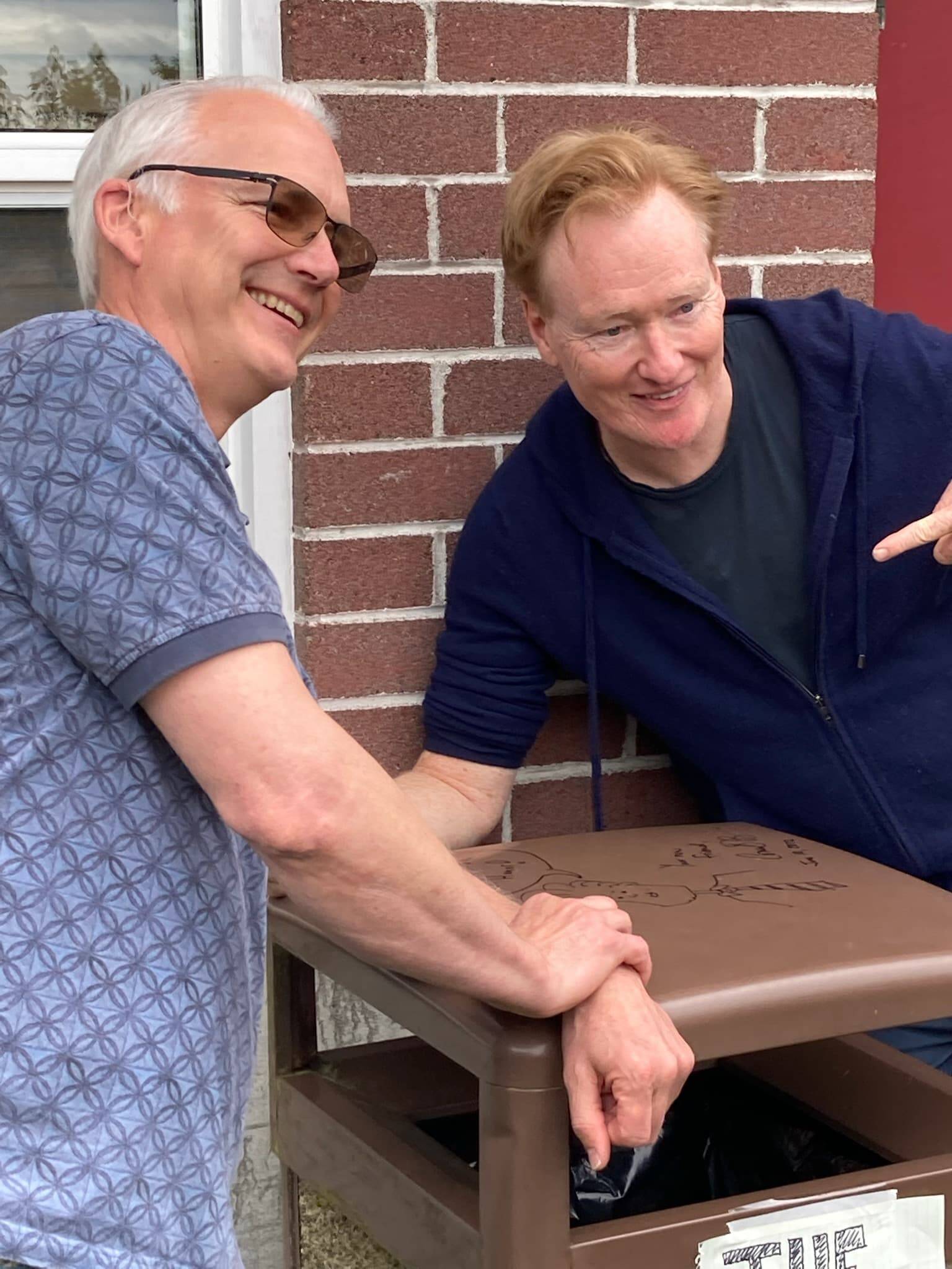Photo by Craig Cyr
Langley Mayor Scott Chaplin poses with late night TV star Conan O’Brien, who visited the Village by the Sea last Friday for the premiere of his wife’s play at the Whidbey Island Center for the Arts.