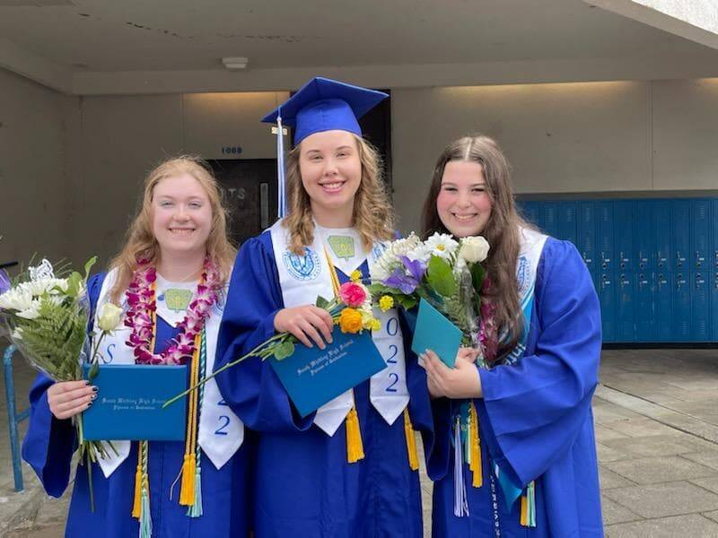 Photo by Jenny Campbell
From left to right, Kalea Staats, Annie Campbell and Julia Maher celebrate their June 4 graduation from South Whidbey High School.