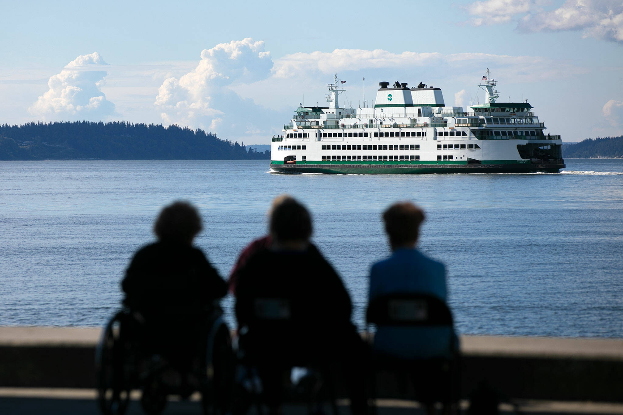 A ferry heads from Mukilteo towards Clinton during the evening commute Thursday. (Ryan Berry / The Herald)