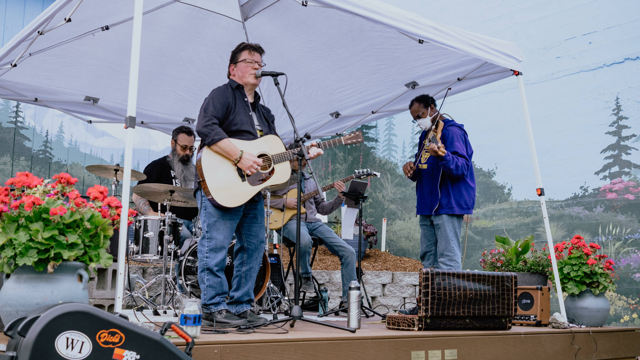 The Erik Christensen Band plays at the pop up plaza. (Photo by Matt Sionson.)