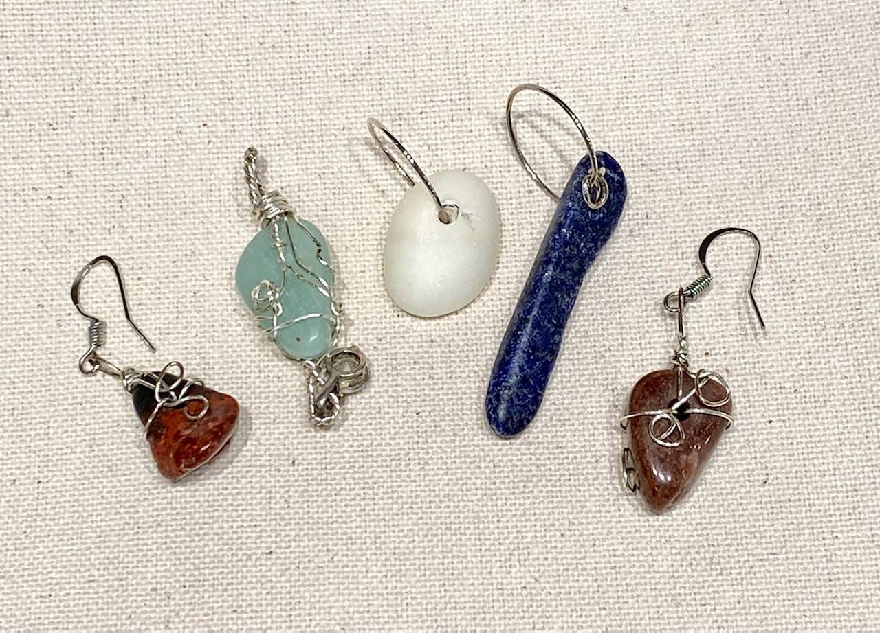 Finished pieces of wire-wrapped jewelry made by Cindy Van Gerpen-Henn. (Photo by Don Wodjenski)