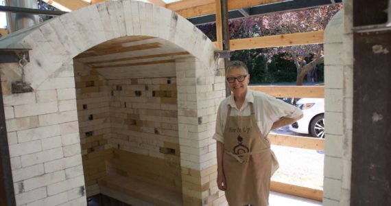 Robbie Lobell is a co-owner of Cook on Clay, which is currently in the process of constructing a new firing kiln next to her studio. (Photo by Rachel Rosen/Whidbey News-Times)
