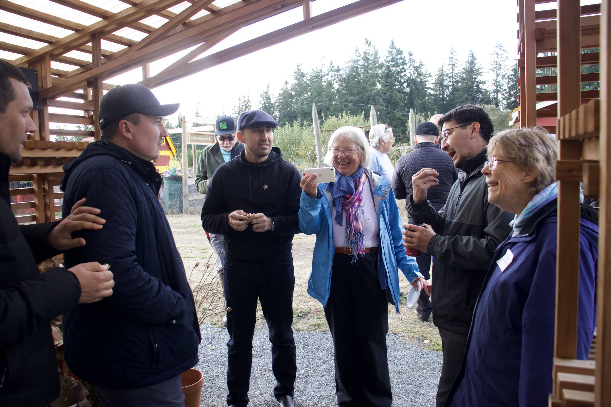 Photo by Rachel Rosen/Whidbey News-Times
(L-R) Abdumumin Shamsiev, an Uzbek farmer, Kakhramon Ishkuhamedov, an agriculture business owner, Maruf Butaev of the Uzbek Ministry of Agriculture, tour leader Charlotte Chase and interpreter Almurad Kasym learn from Susan Prescott of South Whidbey Tilth about organic farming practices.