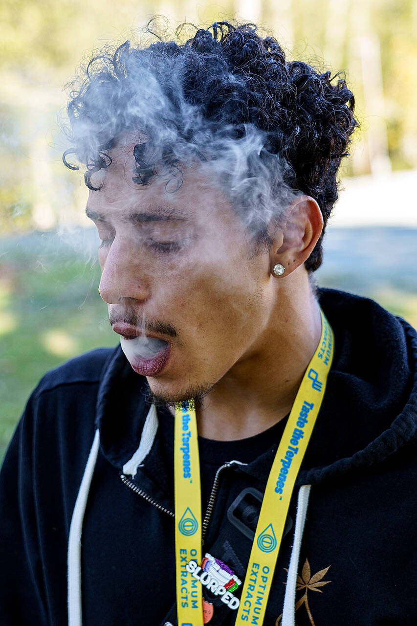 Photo by David Welton
Whidbey Island Cannabis budtender Anthony Banks takes a smoke break.