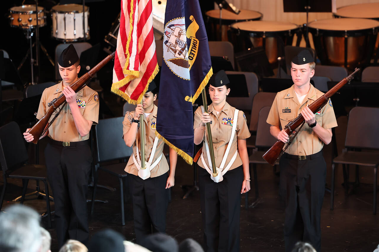 Photo by John Fisken
The Navy Junior ROTC Color Guard parades the colors.