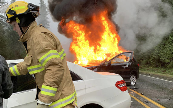 A fatal accident the afternoon of Dec. 18 near Clinton ended with one of the cars involved bursting into flames. The driver of the fully engulfed car was outside of the vehicle by the time first responders arrived at the scene. (Whidbey News-Times/Submitted photo)