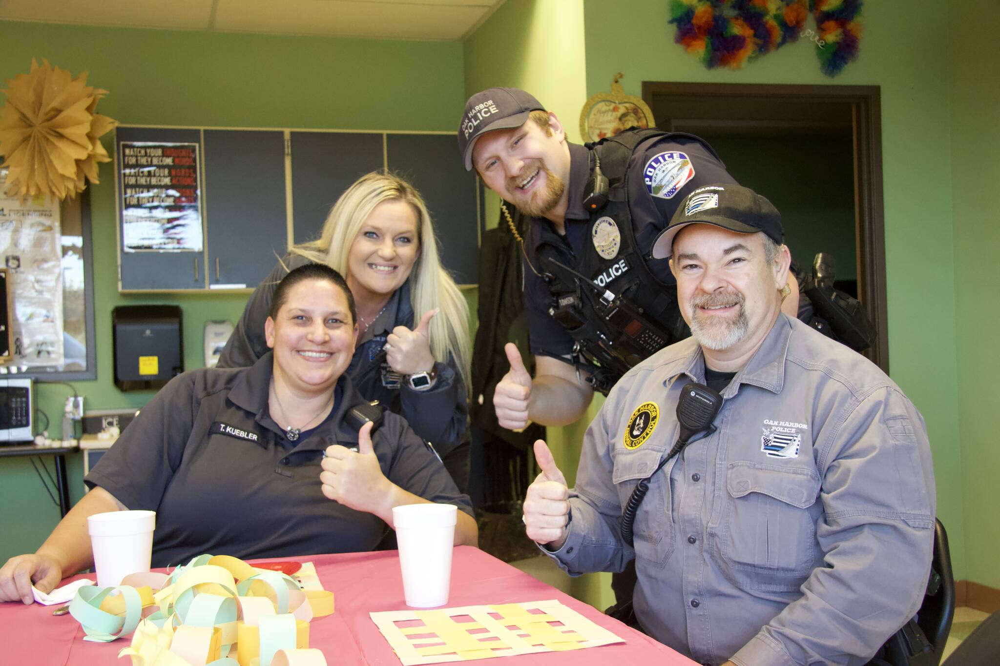 Photo by Rachel Rosen/Whidbey News-Times
From left, Teresa Kuebler, Lacey Lutz, Tyler Adamson and Greg Woodward are some of the first responders who attended Friendsgiving hosted by Exceptional Academy students this year.