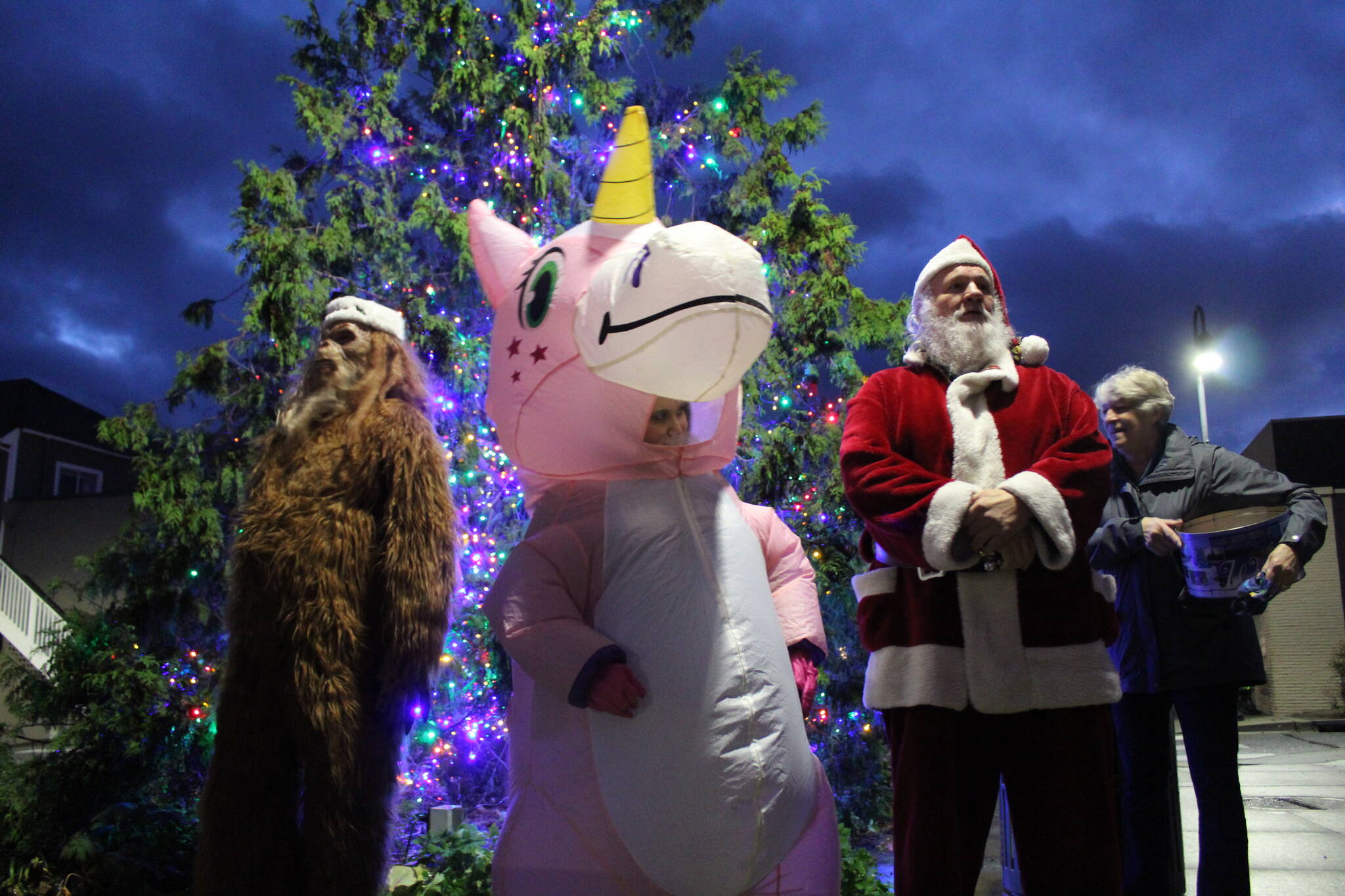 File photo by Karina Andrew/Whidbey News-Times
Some unconventional helpers join Santa at the Oak Harbor tree lighting in 2021.