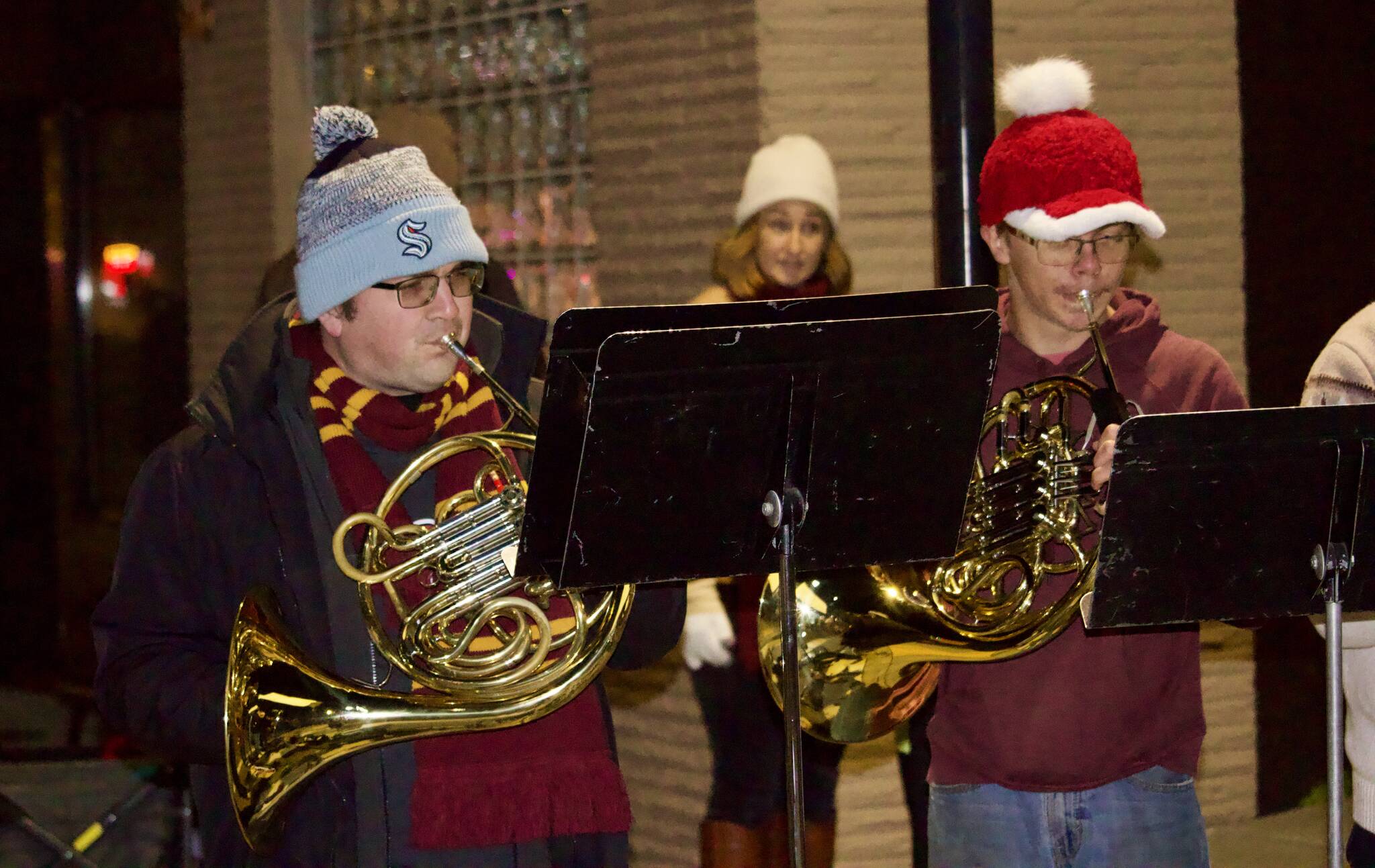 Photo by Rachel Rosen/Whidbey News-Times
French hornists Sean Brown and Ethan Brady play Christmas songs in downtown Oak Harbor.
