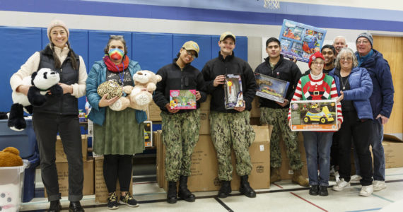 Photo provided
Volunteers with a number of donated toys.