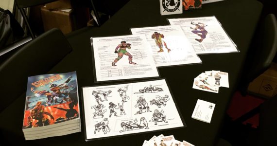 Photo provided
Materials for “World Wide Wrestling,” Nathan D. Paoletta’s wrestling-themed role-playing tabletop game.