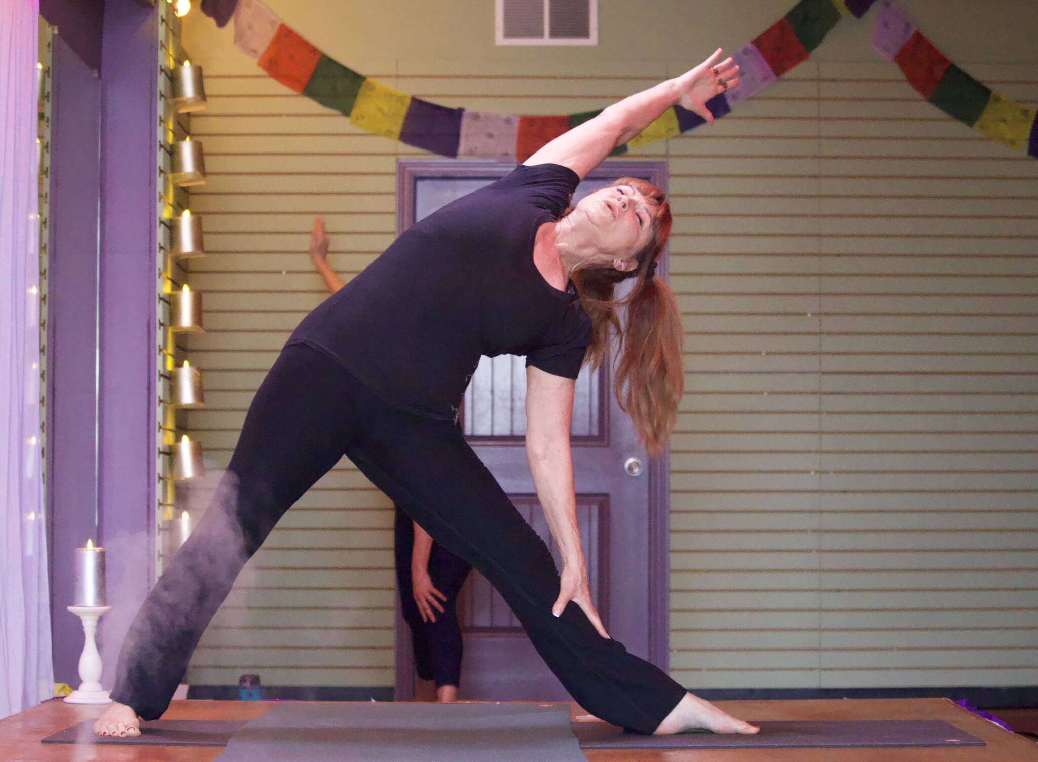 Photo by Rachel Rosen/Whidbey News-Times
Carol Sele, owner of Chrysalis Yoga Shala, leads a vinyasa yoga class that she teaches every Friday morning.