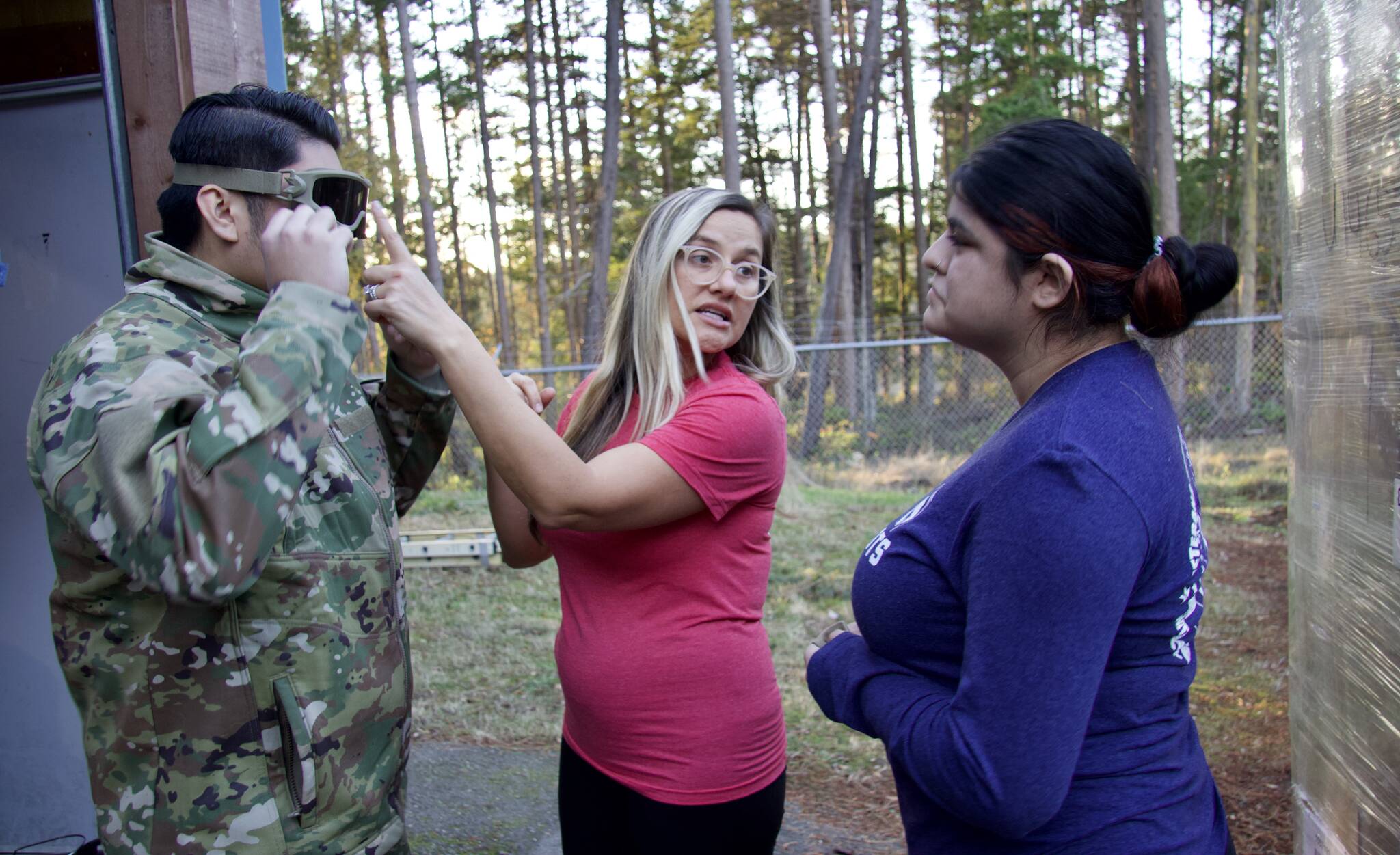 Photo by Rachel Rosen/Whidbey News-Times
Brittni Darbonnier and Julio Bucio show a pair of goggles to Justin Zafra.