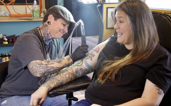 Photo by Rachel Rosen/Whidbey News-Times
Molly Vigallon tattoos Molly Waterbury in Nite Owl’s new location. Vigallon has been working at Nite Owl for eight years.