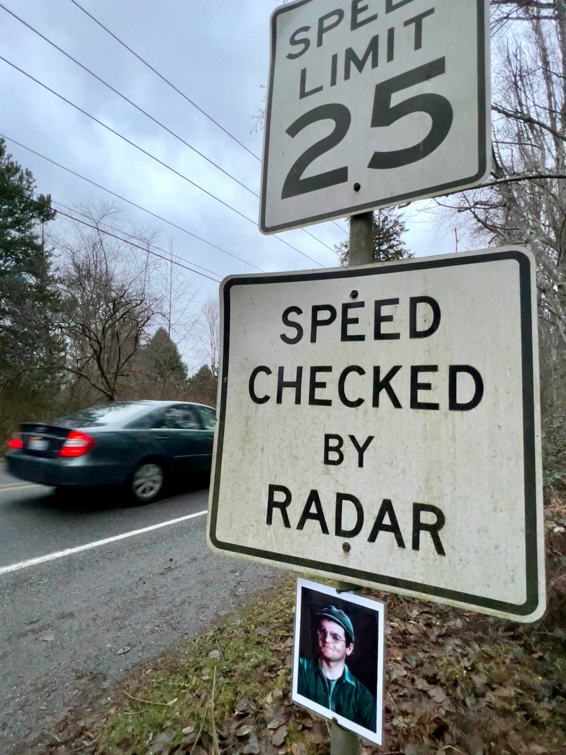 A photo of “M*A*S*H” character Cpl. Walter “Radar” O’Reilly has mysteriously returned to the “Speed Checked by Radar” sign on Third Street coming into Langley on Whidbey Island. (Andrea Brown / The Herald)