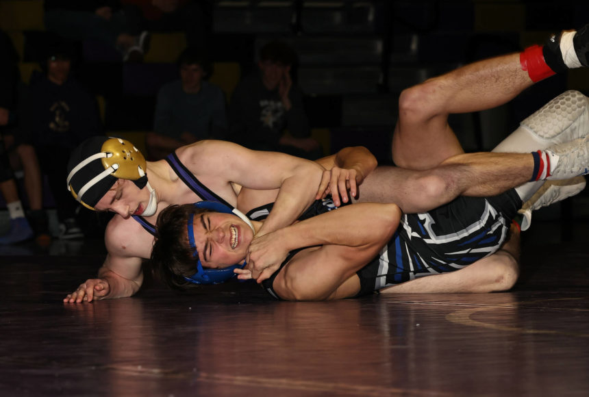 <p>Photo by John Fisken</p>
                                <p>Oak Harbor athelte Percie Hatfield pins an oppnent at a Jan. 17 wrestling match aginst South Whidbey. The boys varsity wrestling team won 55-24.</p>
                                <p>“South Whidbey was a great match for us. The Falcons challenged us at a lot of our stronger weight classes, winning some matches against our better wrestlers,” said head coach Perer Esvelt. “Our communities are close when it comes to wrestling, so seeing a competitive match between us is great, as we can partner in the off-season and see both teams improve.”</p>