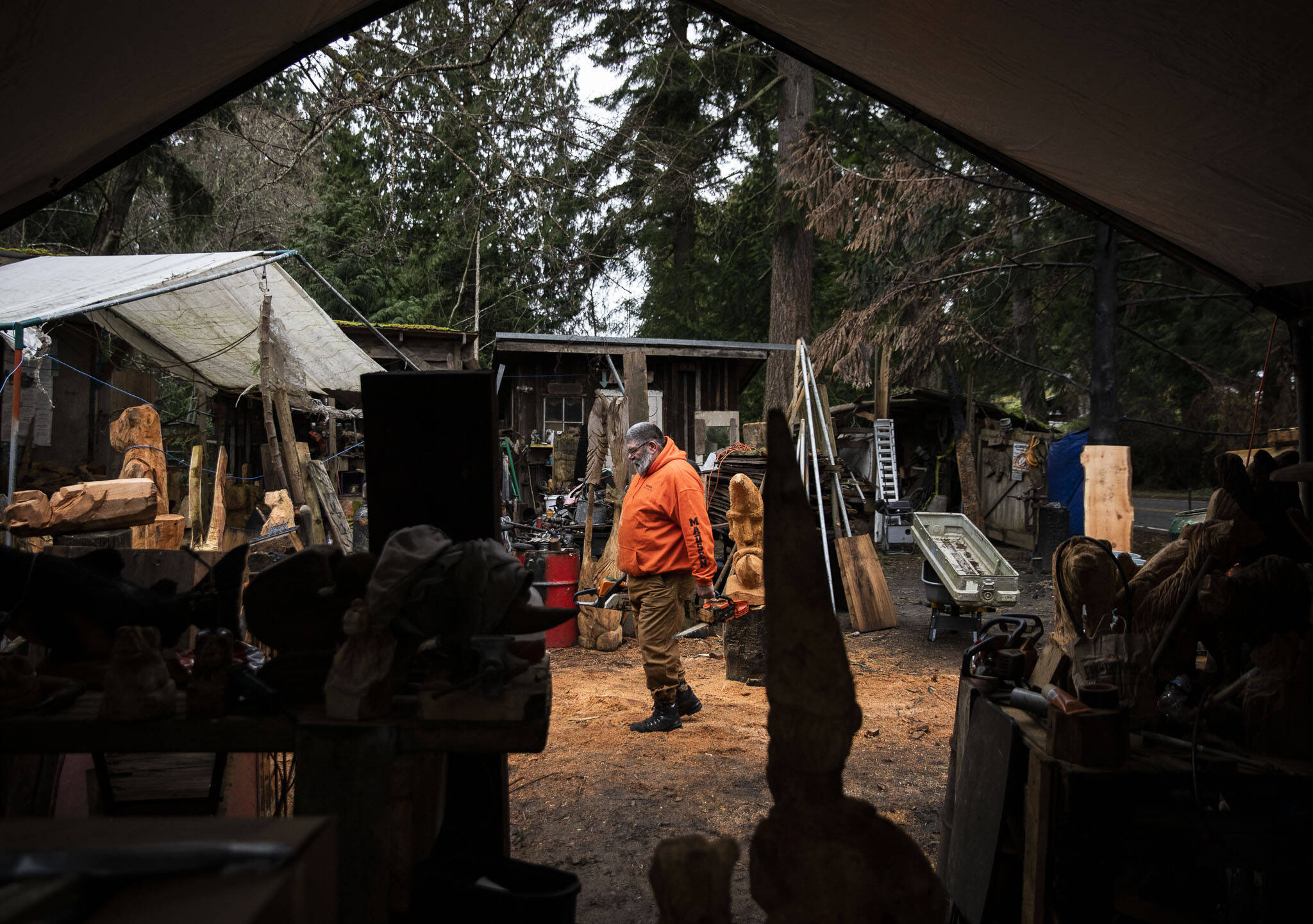 Steve Backus walks around the grounds as he works on different projects in Clinton. (Olivia Vanni / The Herald)