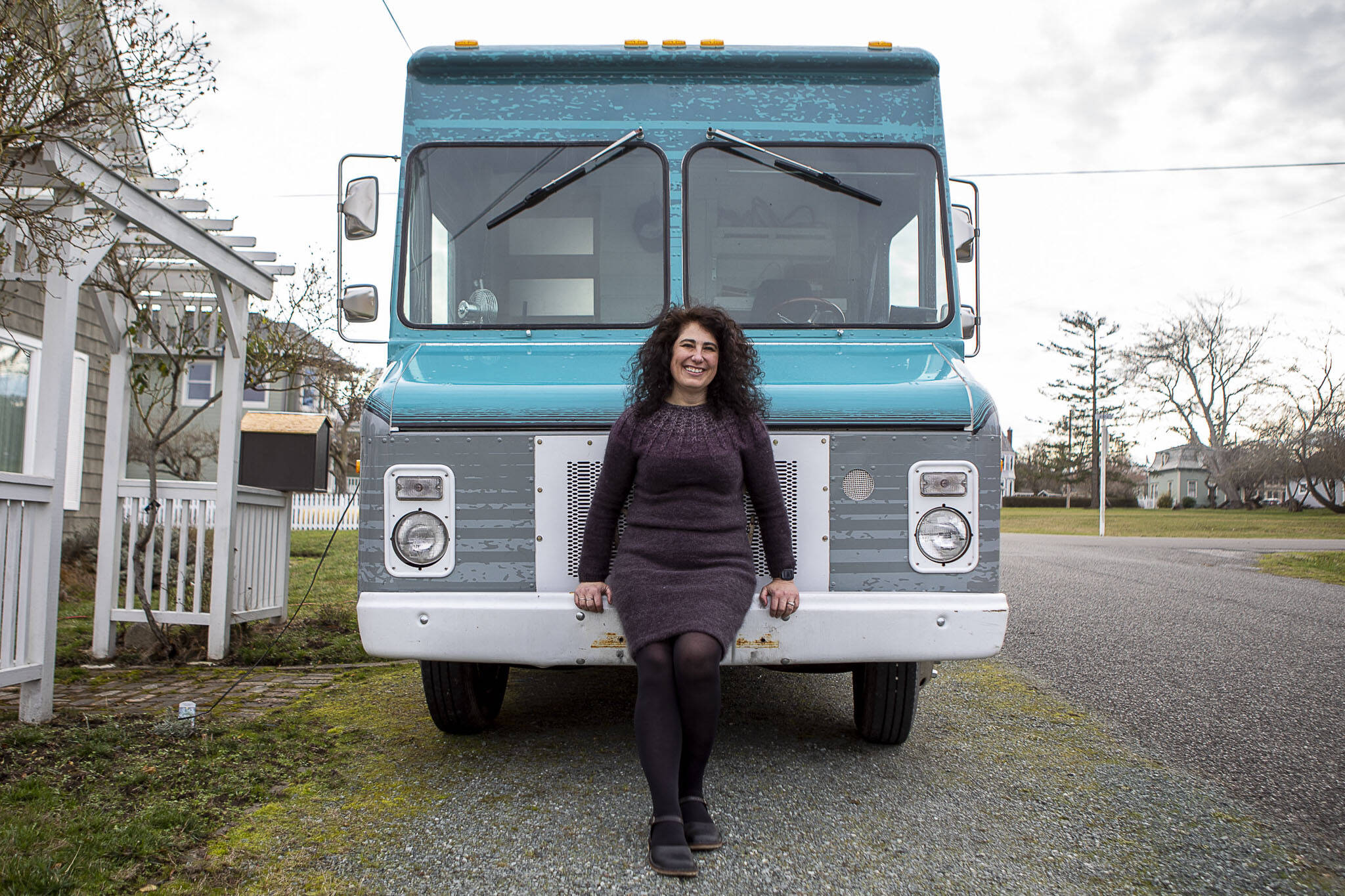 Photos by Annie Barker / The Herald
Willow Mietus, 50, on Feb. 1 stands in front of “The Wool Wagon” parked outside her home in Coupeville.