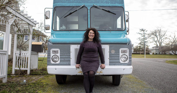 Willow Mietus, 50, poses for a photo at her home in Coupeville, Washington on Wednesday, Feb. 1, 2023. Mietus bought a former Frito-Lay truck to sell her dyed yarn out of. She calls it "The Wool Wagon." (Annie Barker / The Herald)