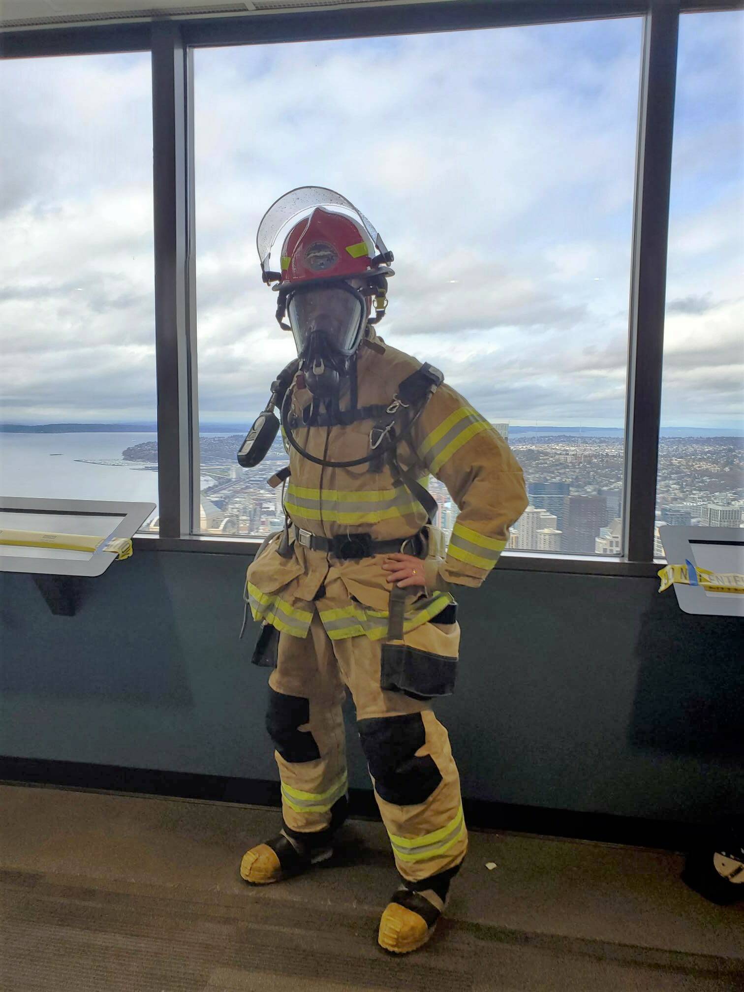Photo provided
South Whidbey resident Jim Towers stands at the top of the Columbia Center after last year’s firefighter stairclimbing event in Seattle.