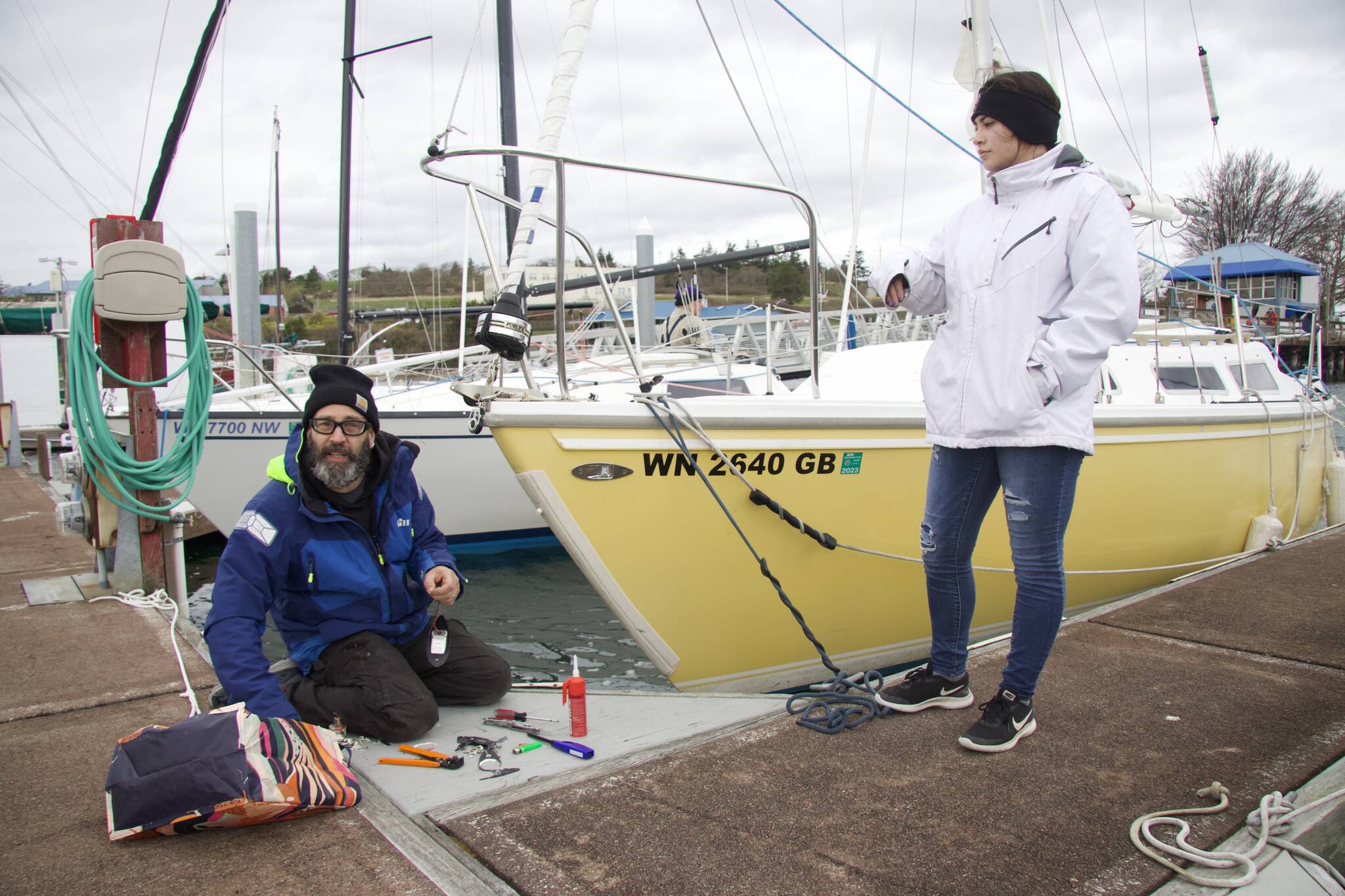 Brian Vick (left) and his daughter Raven sail their boat Lemonade in the Oak Harbor Yacht Clubs Frostbite Series. (Photo by Rachel Rosen/Whidbey News-Times)