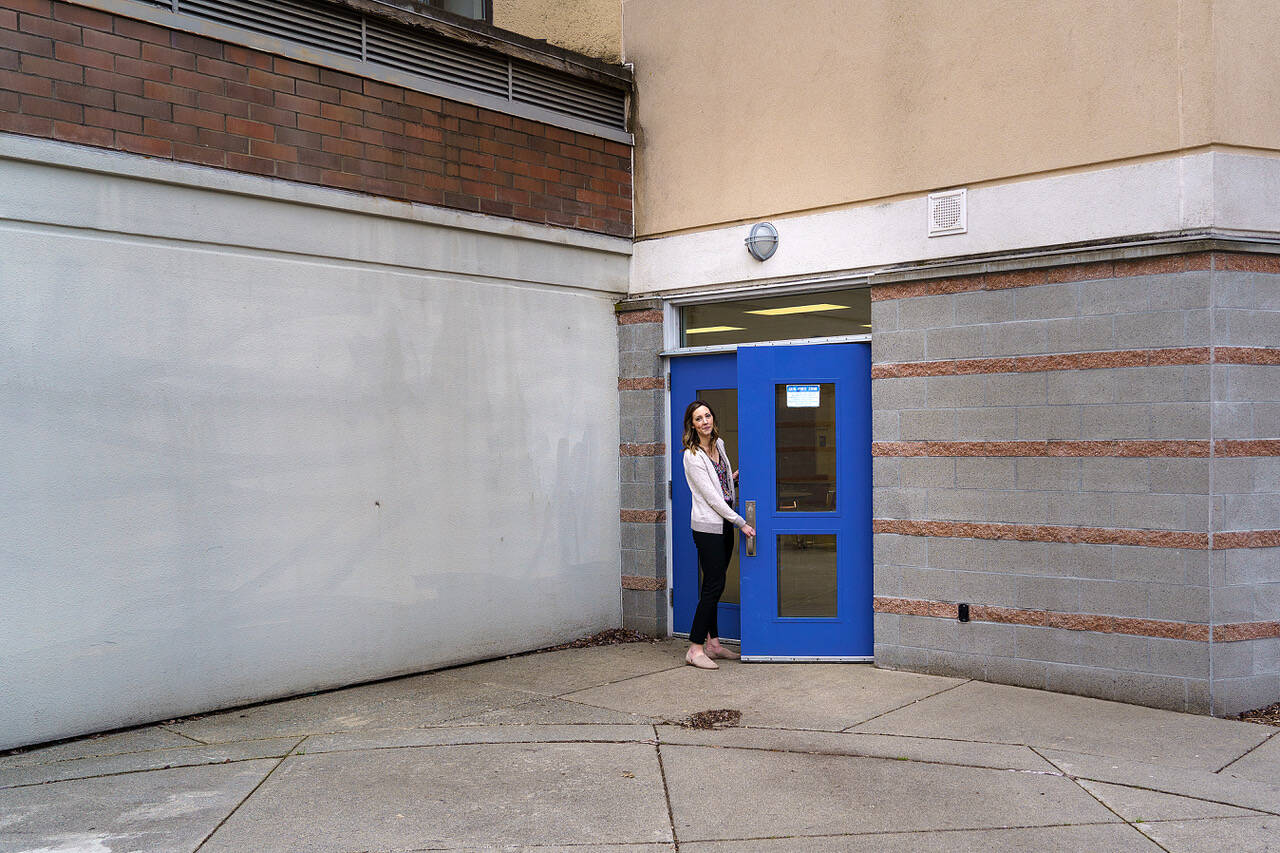 South Whidbey Middle School Principal Kayla Phillips stands next to what will become the new entrance for grades 6-8 at the middle school/high school campus. (Photo by David Welton)