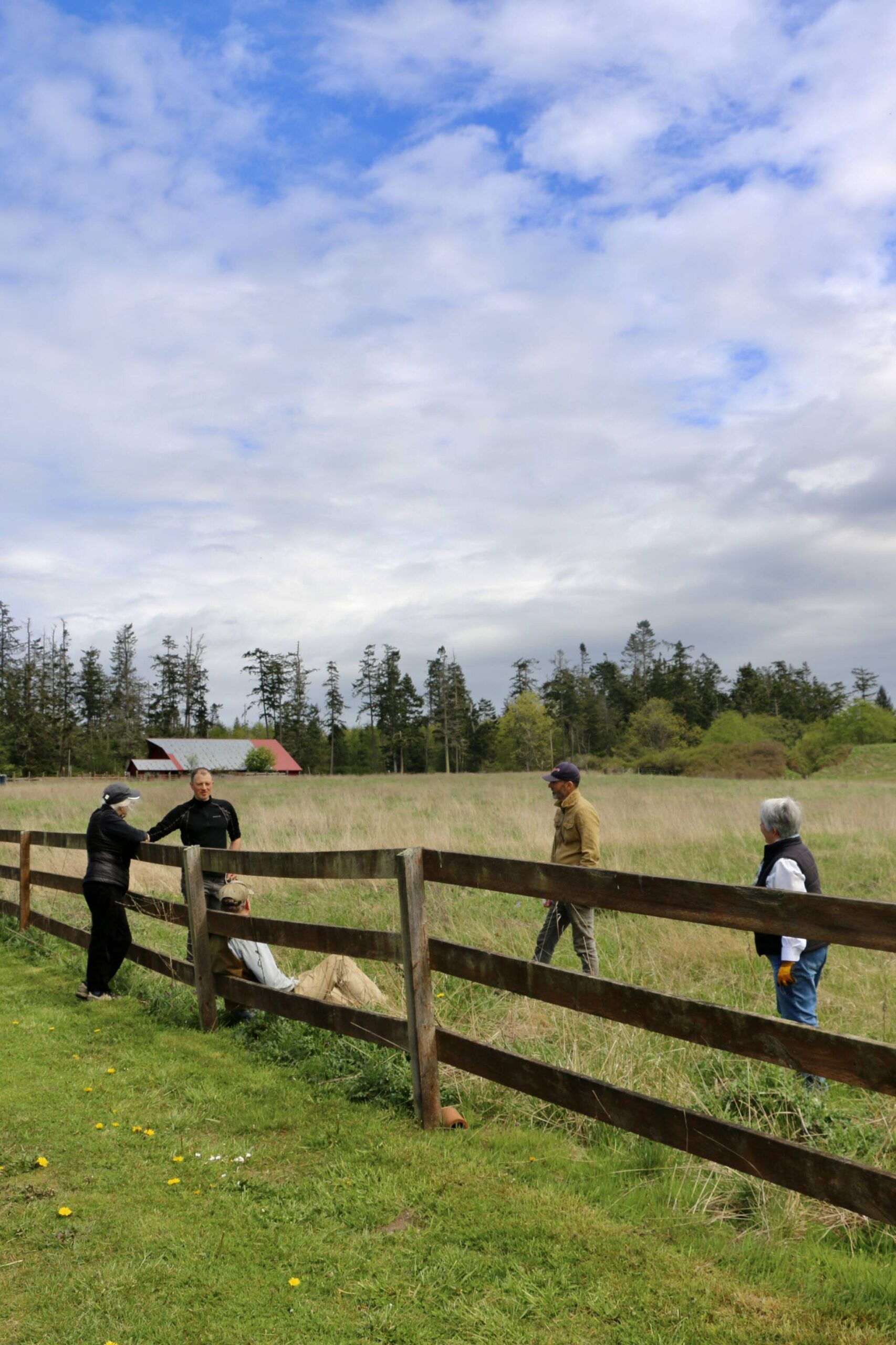 Photo provided
Volunteers help clean up the historic working farm on Keystone Preserve during a work party April 26.