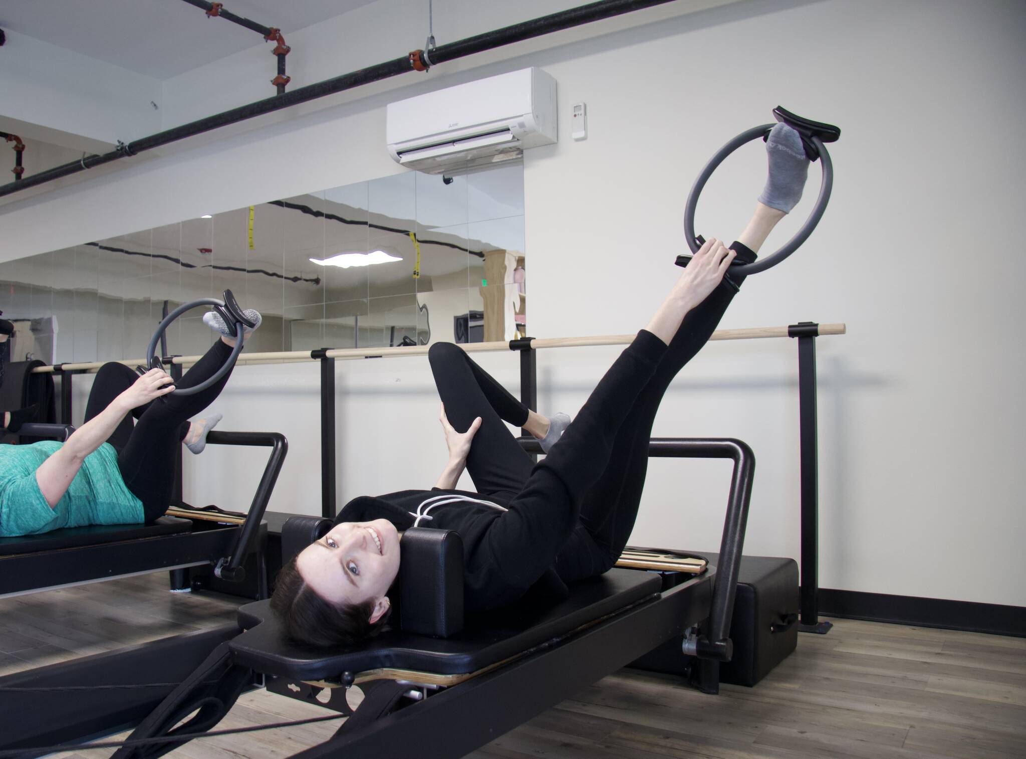 Photo by Brandon Berry
Some Pilates classes involve the use of resistance ring.