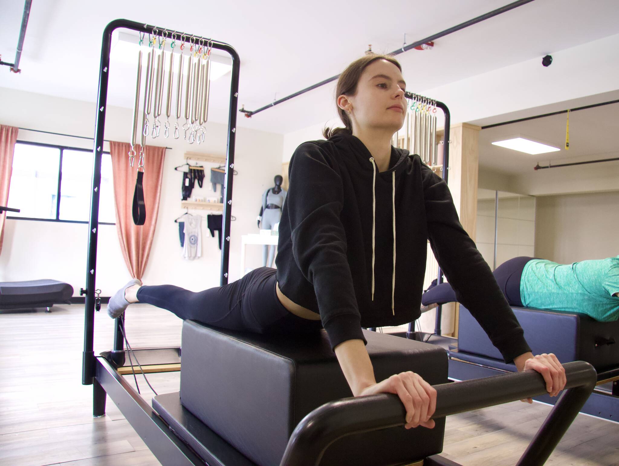 Photo by Brandon Berry
Traditional Pilates classes utilize a reformer machine.