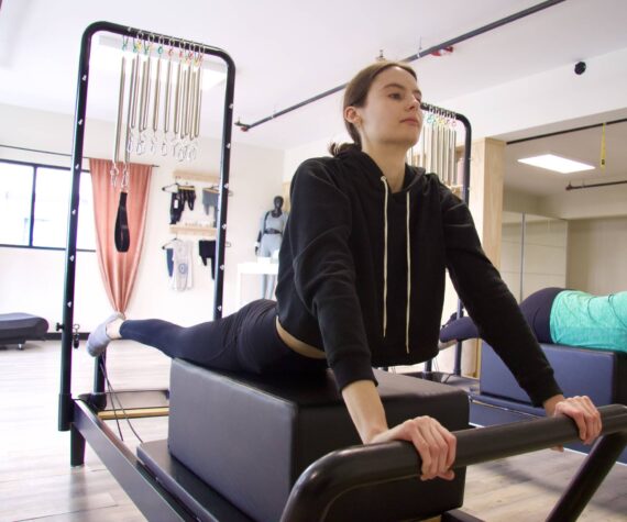 Photo by Brandon Berry
Traditional Pilates classes utilize a reformer machine.