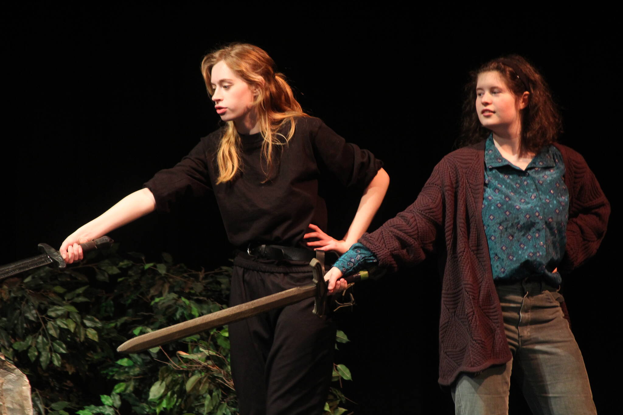 Wynter Arndt, left, and Birdie Sinclair play sisters Tilly and Agnes Evans, who take on monsters in a Dungeons and Dragons adventure Tilly wrote before her death.