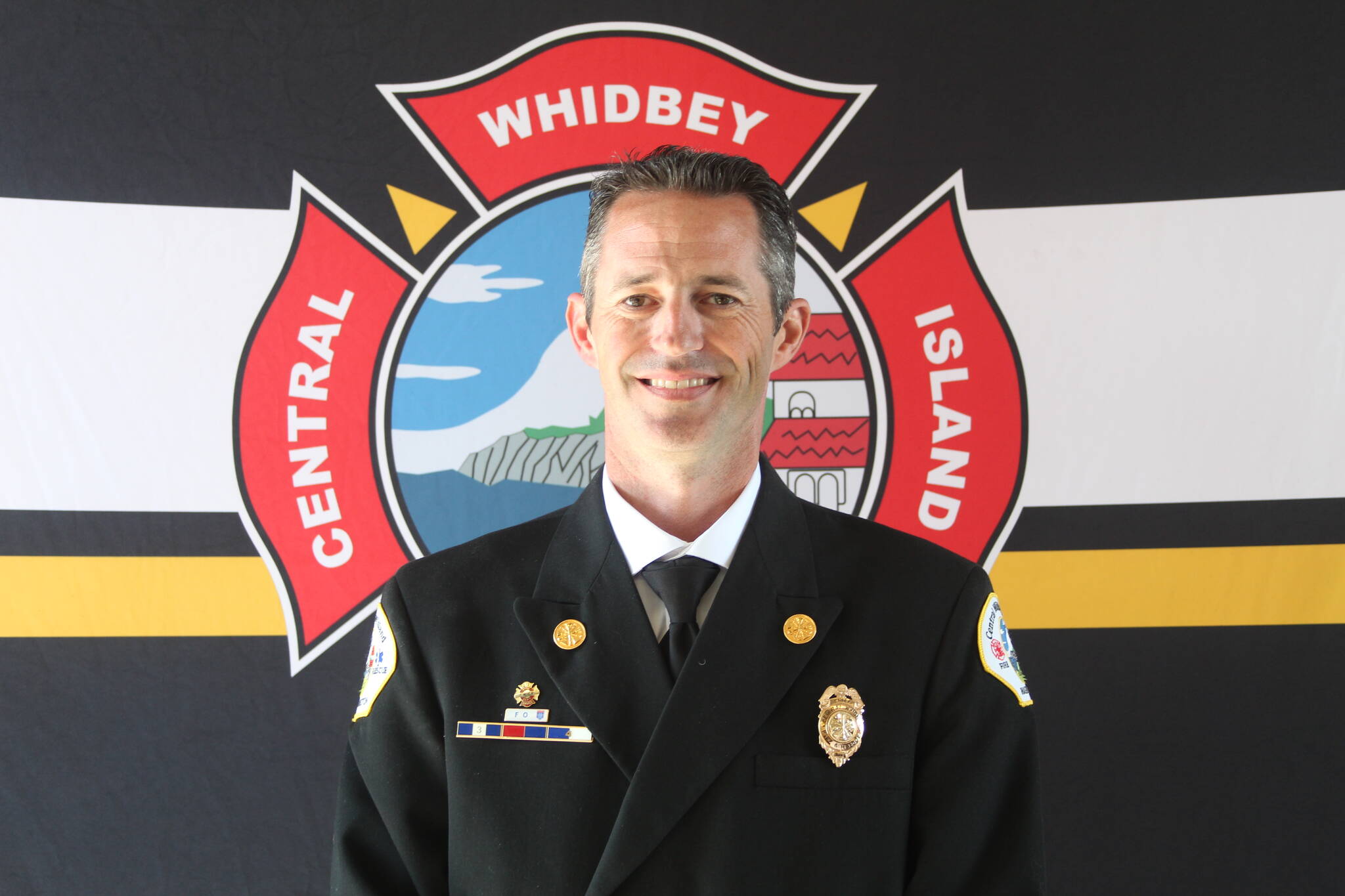 Photo by Karina Andrew/Whidbey News-Times
Longtime Central Whidbey Island Fire and Rescue firefighter Jerry Helm was sworn in as chief for the district at the fire station in Greenbank May 16.