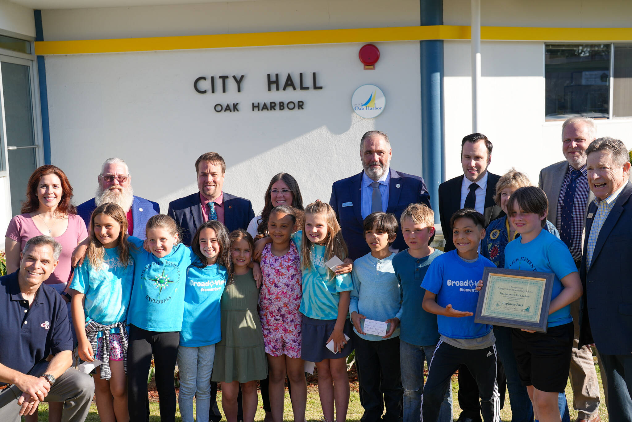 Oak Harbor City Council members present an award of recognition to a Broadview Elementary School third grade class, which submitted the winning name for a new park in the city. (Photo provided)