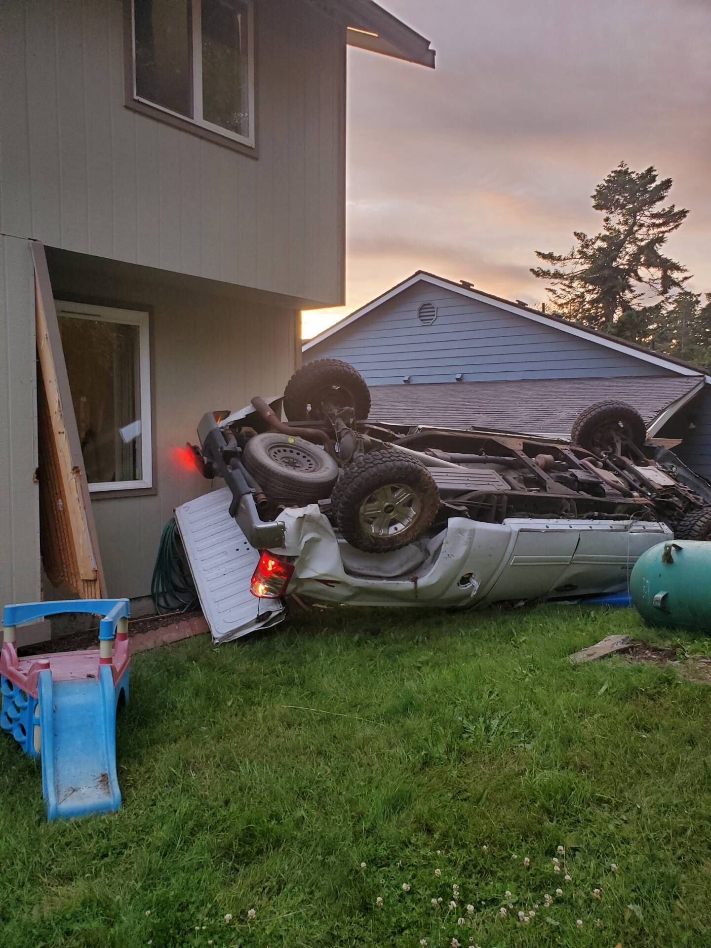 A Burien man rolled a pickup truck into a North Whidbey residence Tuesday evening. (Photo provided)