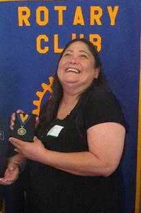 Tanya Stager-Gran, executive director of the Whidbey Homeless Coalition, receives the Rotary’s Paul Harris medal for her selfless service. (Photo by Spring Roehm)