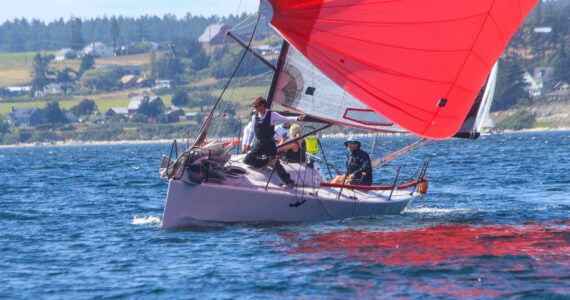 A crew sails Friday, competing against sailors from different yacht clubs around the Puget Sound area. (Photo by Luisa Loi)