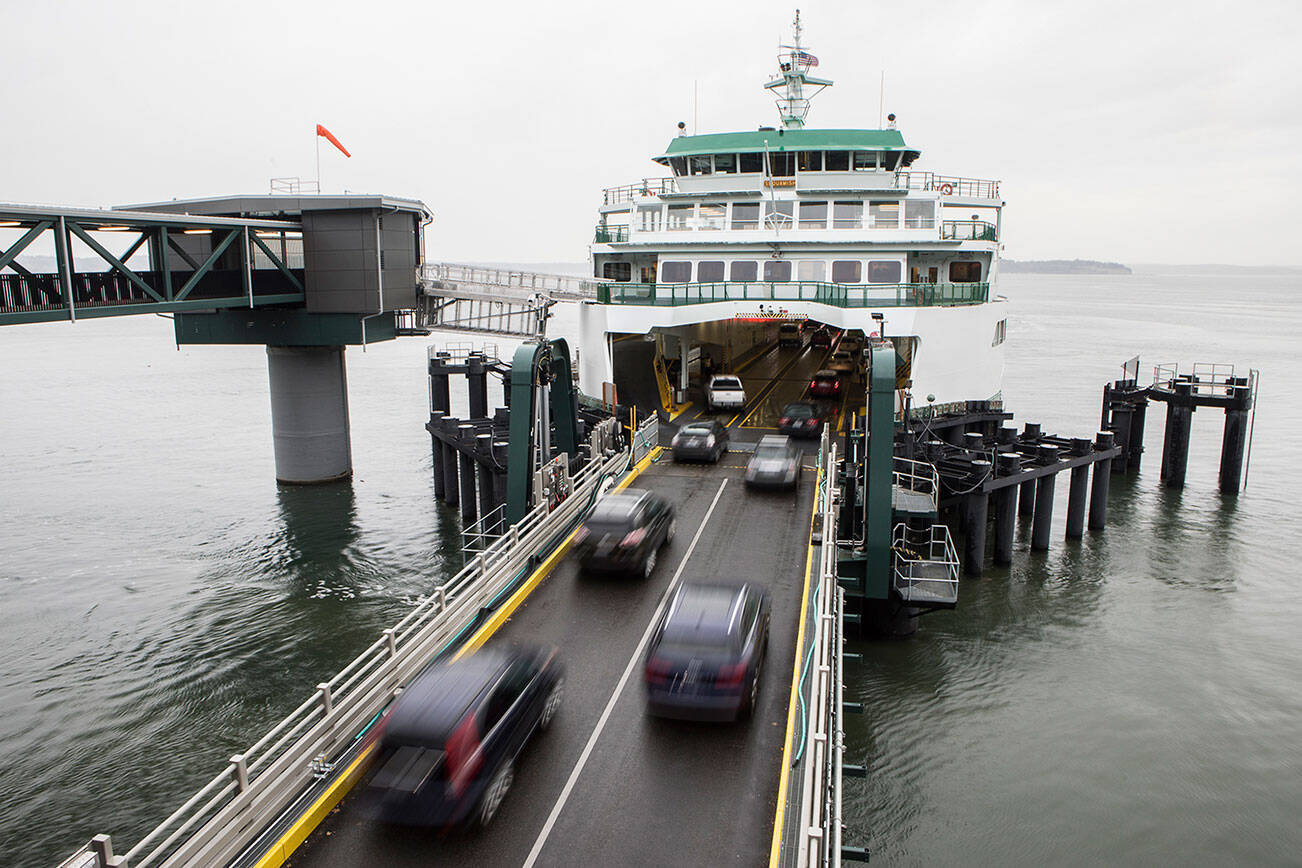 Cars drive onto the ferry at the Mukilteo terminal on Monday, Nov. 1, 2021 in Mukilteo, Washington. (Olivia Vanni/The Herald)