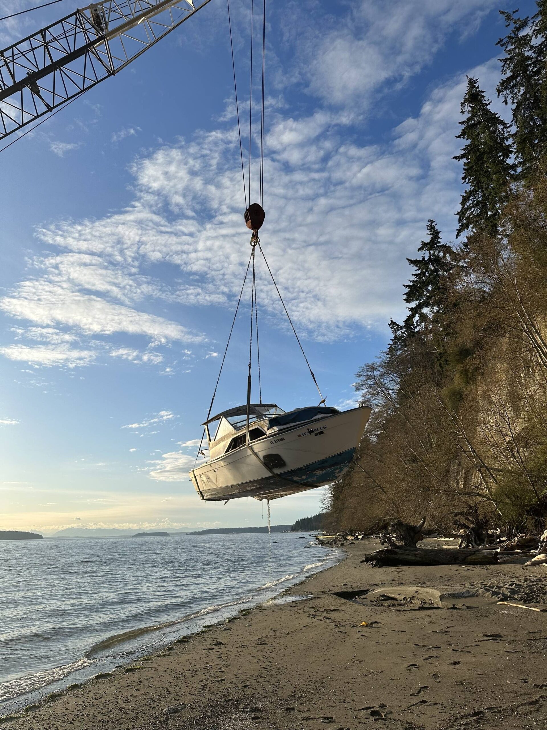 Photos provided
The Washington State Department of Natural Resources and the Island County Marine Resources Committee coordinate to remove derelict vessels from the Whidbey Island shoreline.