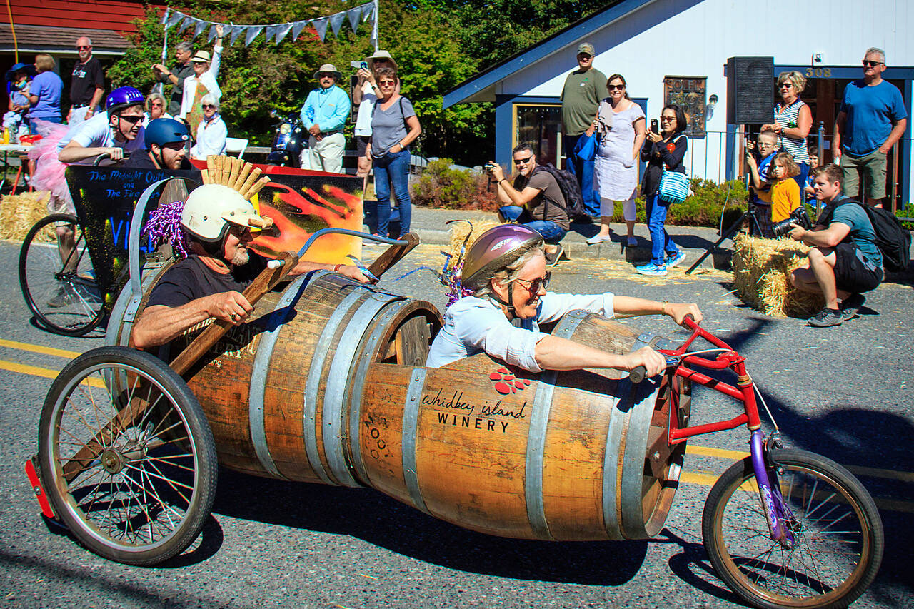 Greg and Elizabeth Osenbach raced a particularly memorable car made out of wine barrels during previous Soup Box Derbies. (Photo by David Welton)