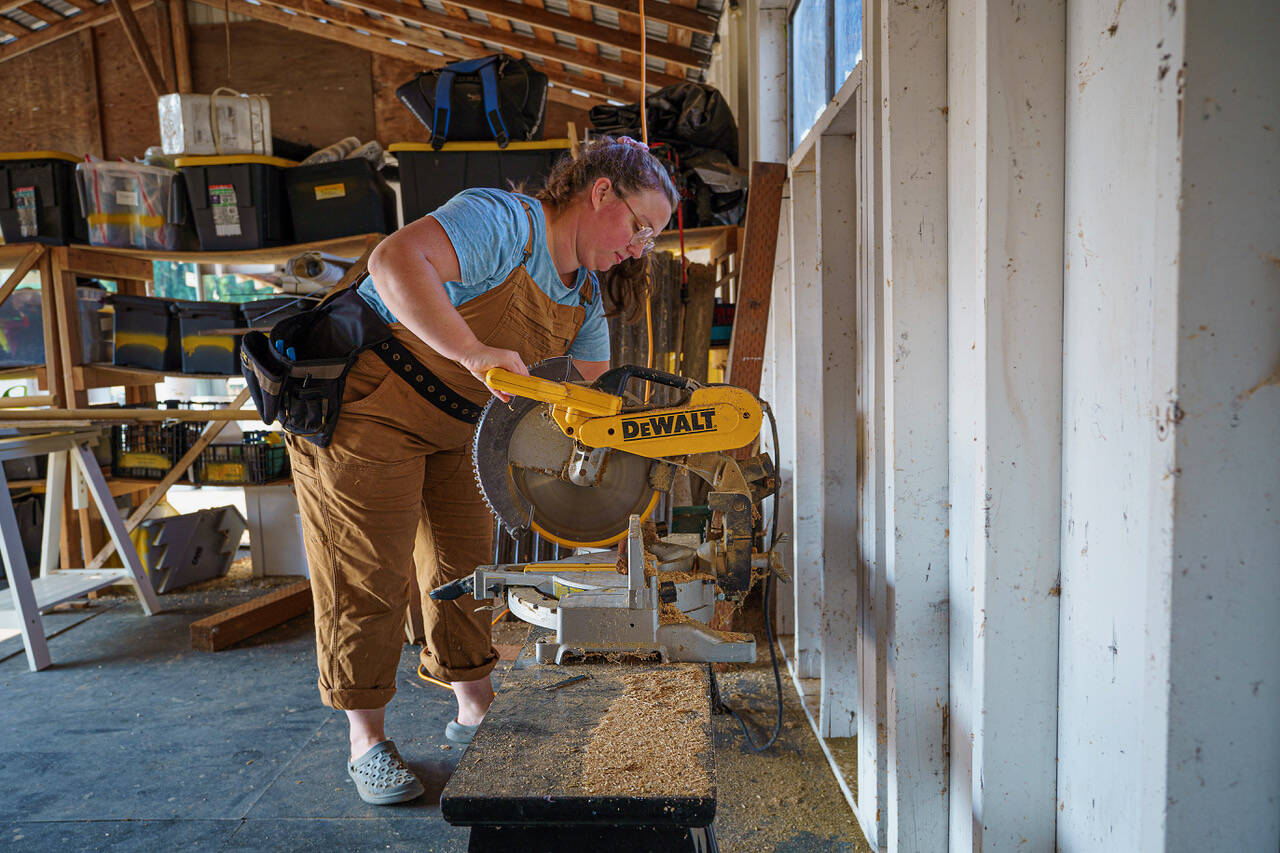 Photo by David Welton
Mackenzie Wright operates a power saw. Someday she hopes to have classes teaching women how to use power tools, which she said can be intimidating at first.