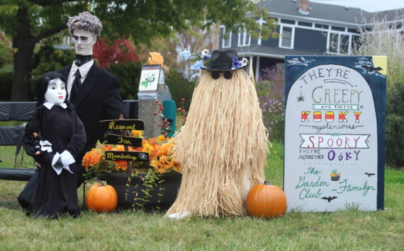 Members of the Addams Family take up residence in Cook’s Corner Park for Coupeville’s annual scarecrow competition. (Photo by Karina Andrew/Whidbey News-Times)