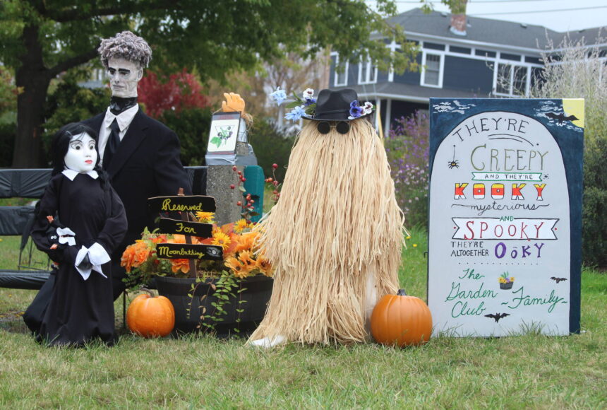 <p>Members of the Addams Family take up residence in Cook’s Corner Park for Coupeville’s annual scarecrow competition. (Photo by Karina Andrew/Whidbey News-Times)</p>