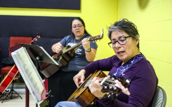 Photo by Luisa Loi
Right to left, Candy O'Neal and Melissa Johnson play at the Guitars for Vets Sunday Jam.