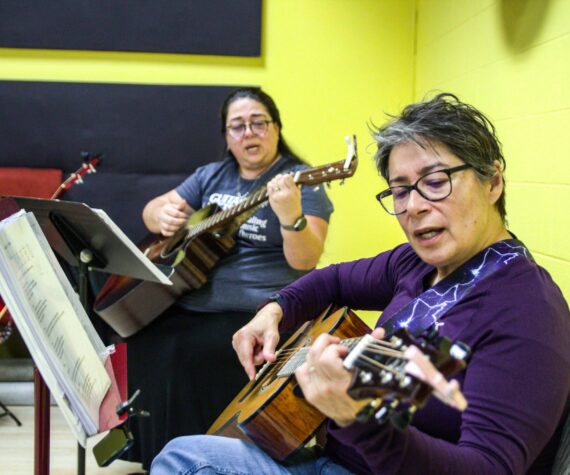 Photo by Luisa Loi
Right to left, Candy O'Neal and Melissa Johnson play at the Guitars for Vets Sunday Jam.